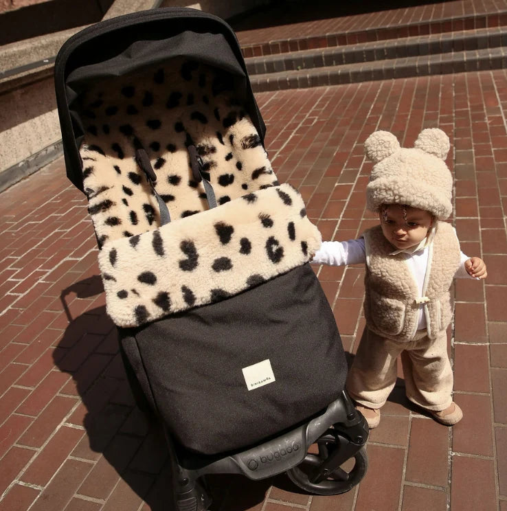 Voetenzak Puffmuff® - Merino schapenvacht - Noir + Leopard - BINIBAMBA