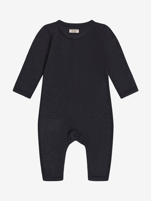 Boxpakje Dark Navy – TENCEL™ & merinowol – HUTTEliHUT: achteraanzicht van het donkerblauwe boxpakje.