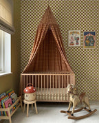Quilt Check Olive Green – Atelier Chien: wallpaper behind a crib with a canopy and rocking horse.