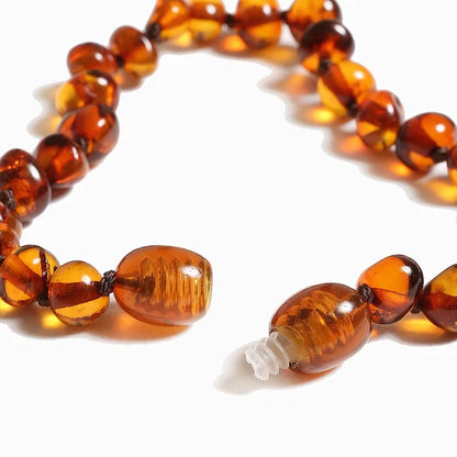 Alwero - Coni barnsteen armband - Congac - 14 cm - close up