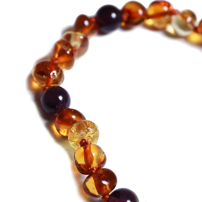 Alwero - Coni barnsteen ketting baby - 32 cm - Amethyst - close up