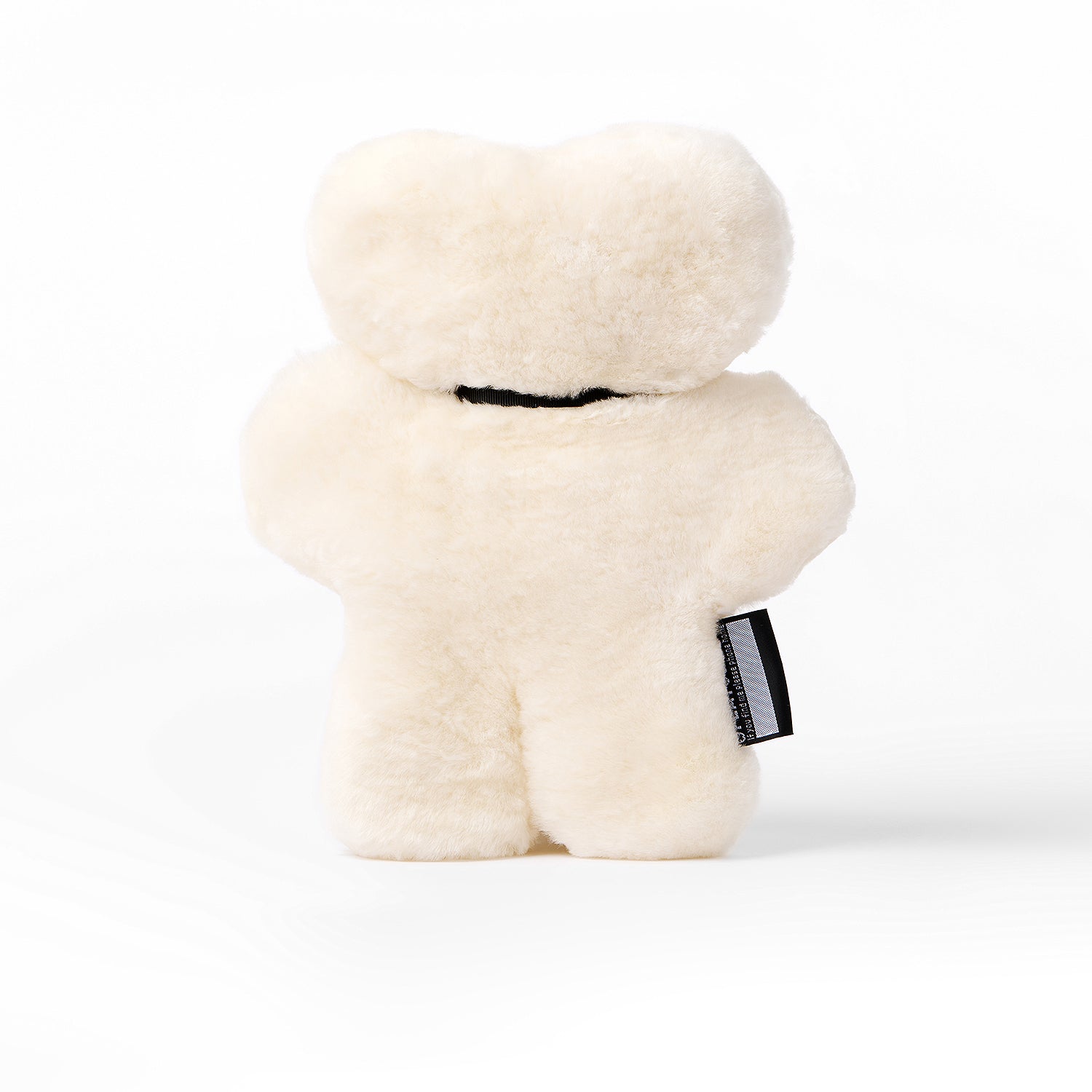 FLATOUTbear Original - 100% Australische schapenvacht - Knuffelbeer milk achterkant