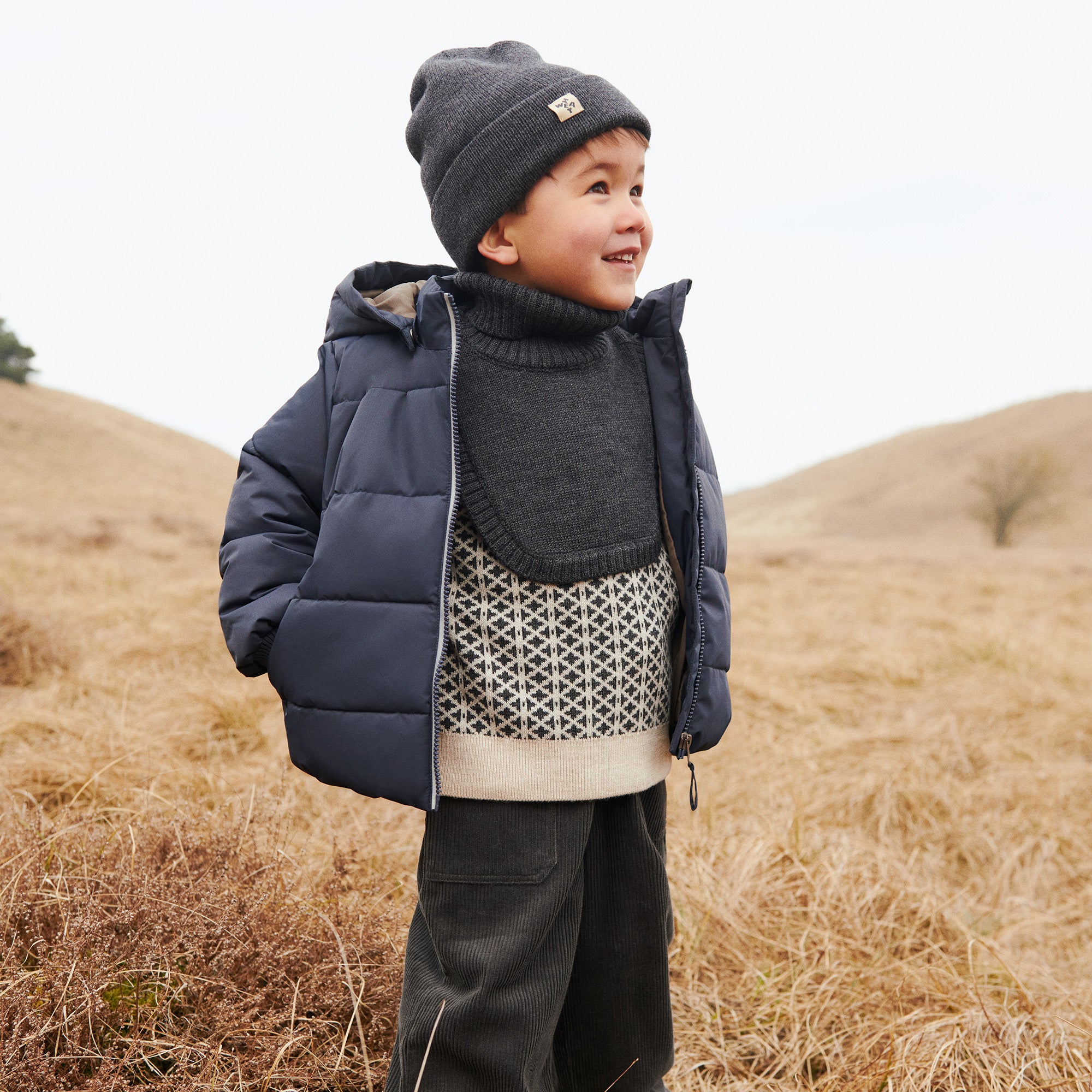 Kinder muts Omalas - Merino wol - Charcoal melange/grijs - Wheat jongen