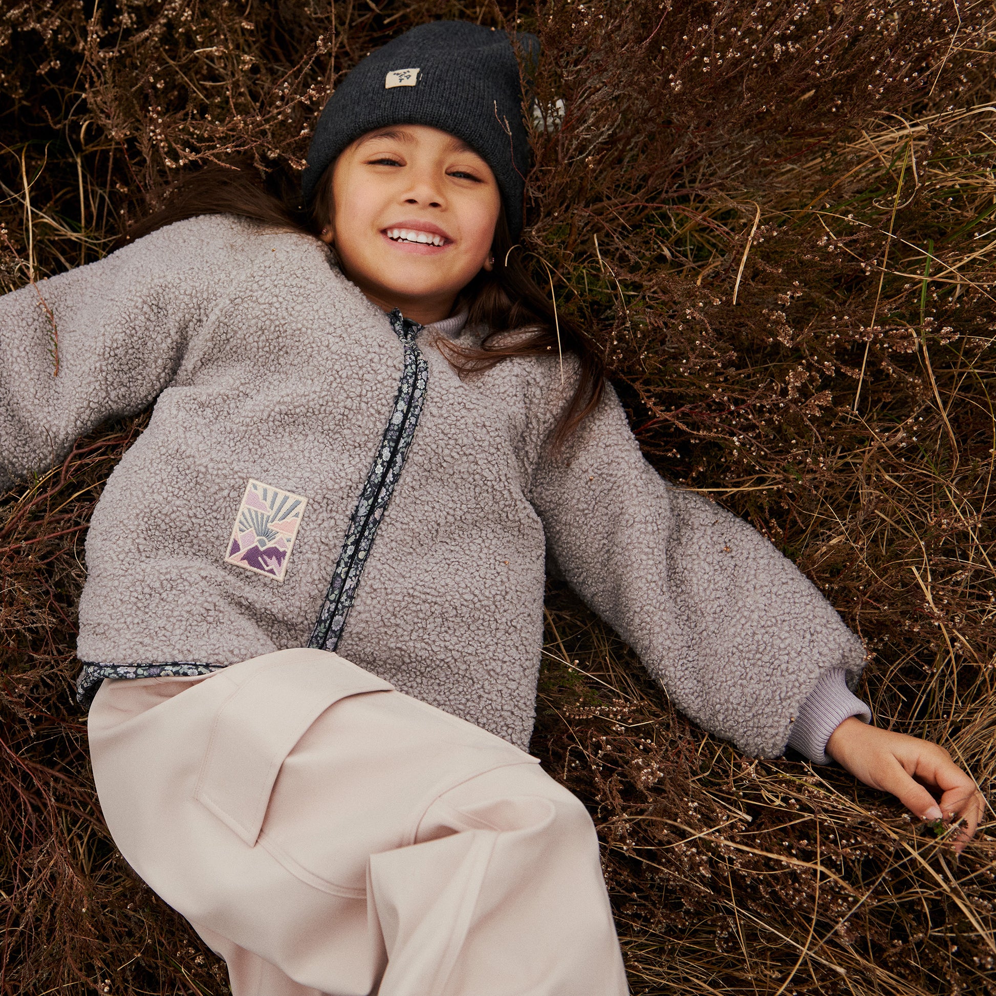 Kinder muts Omalas - Merino wol - Charcoal melange/grijs - Wheat meisje