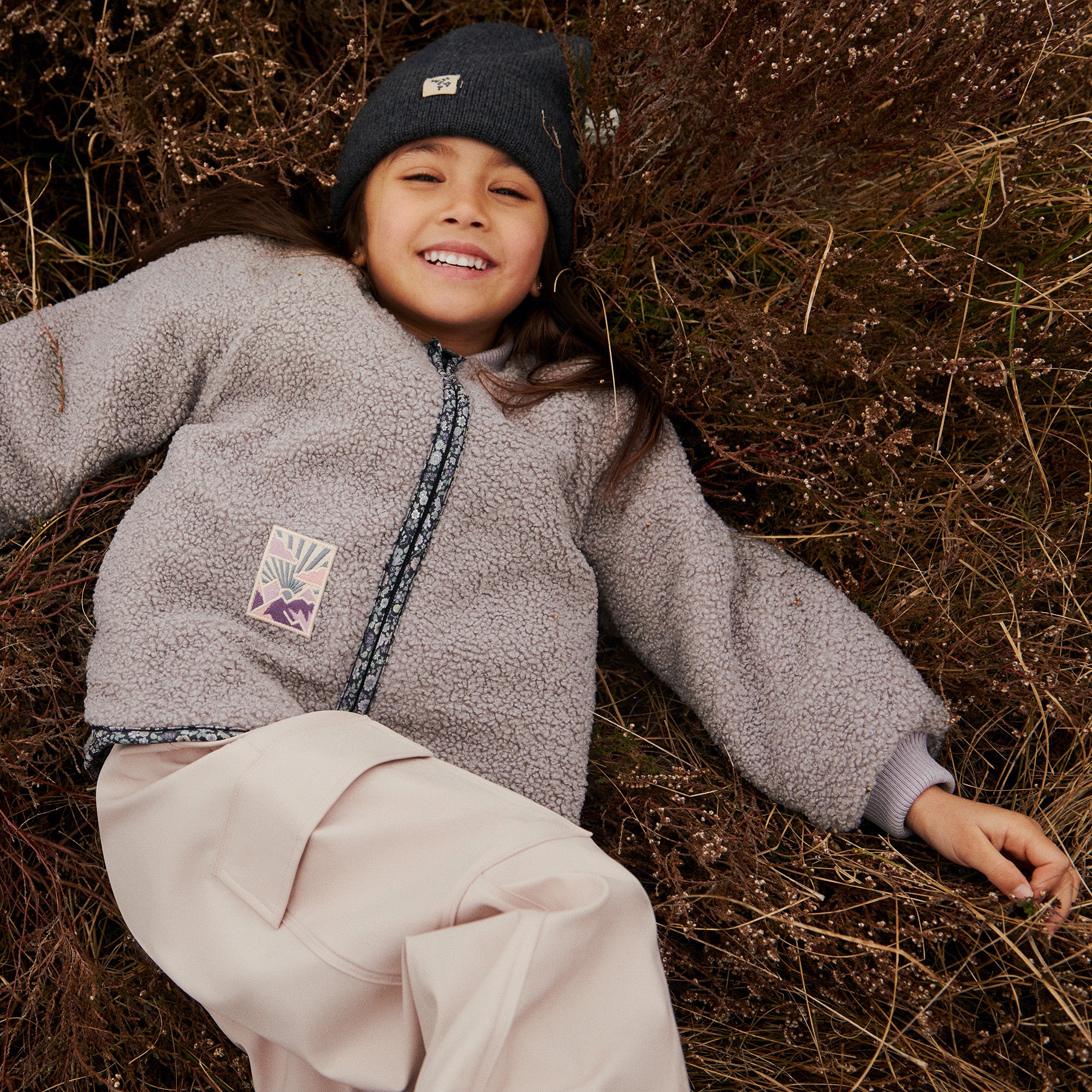 Kinder muts Omalas - Merino wol - Charcoal melange/grijs - Wheat meisje